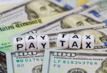 Why You Might Have an Estate Tax Issue Soon Individual income tax return of one hundred dollar bills Pay Tax