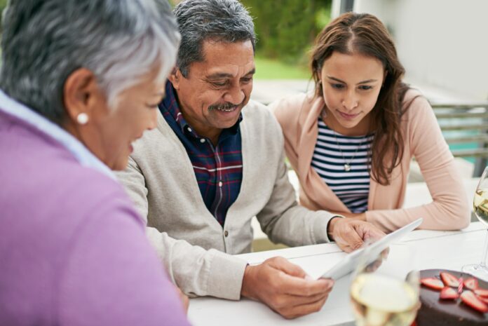 cropped-shot-of-a-senior-man-showing-his-family-so-2026-01-09-09-40-55-utc senior man showing family documents